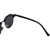 Hinges of Hokky 'Bella' sunglasses with a round frame, featuring black and gold color accents and dark lenses.