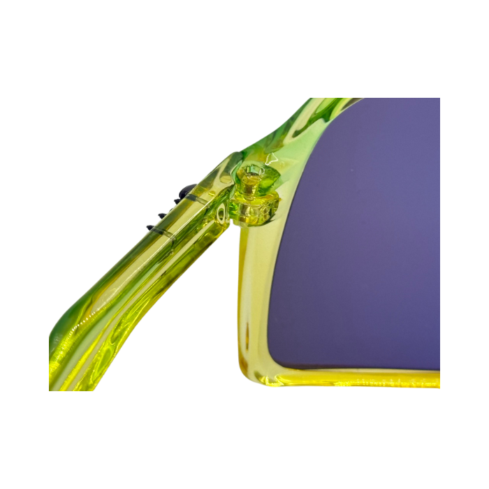 Close-up of a yellow-framed sunglasses with a purple lens on a white background