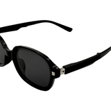 Hinges of foldable, round-framed Black Colour sunglasses and polarized lenses.