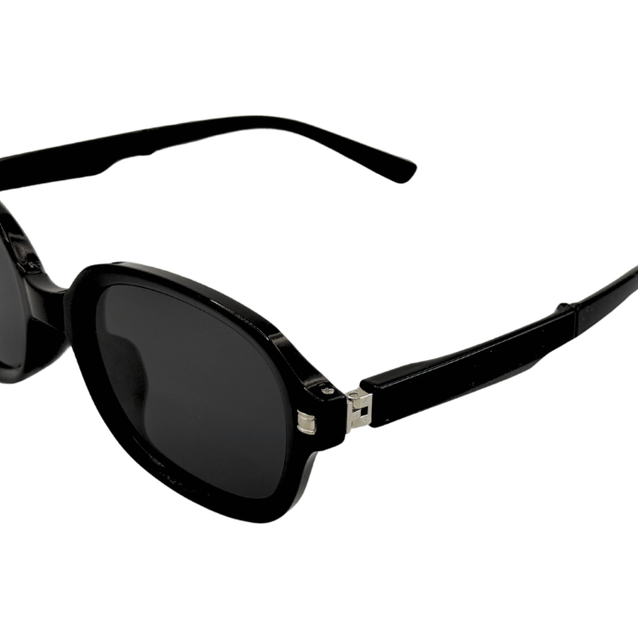 Hinges of foldable, round-framed Black Colour sunglasses and polarized lenses.