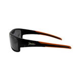 A pair of black sports sunglasses with orange accents on the arms and hokky logo on it.