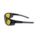 Side View of black sports sunglasses with polarized yellow uv protected lenses designed for outdoor activities like surfing.