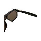 Hinges of 'Amalfi' sunglasses featuring a black frame with gold accents and dark lenses.
