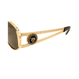 A pair of 'Regina' women's sunglasses with a gold metal frame and Notte Temple Detail.