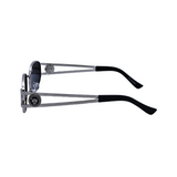 Side View of 'Regina' women's sunglasses with a silver metal frame and blue polarized lenses.