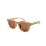 Beige sunglasses with brown lenses on a white background