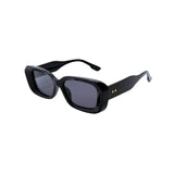Black sunglasses with a glossy finish on a white background