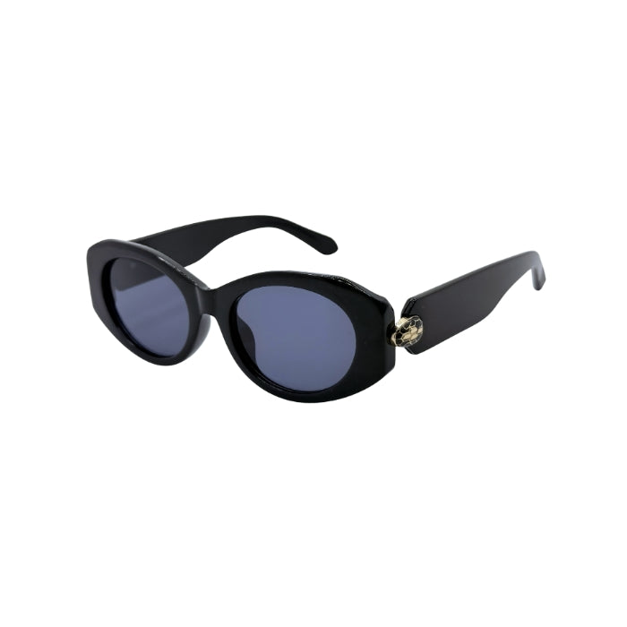Black sunglasses with a gold accent on a white background