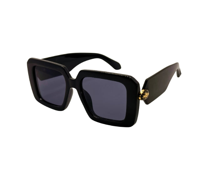 Black sunglasses with a gold accent on a white background