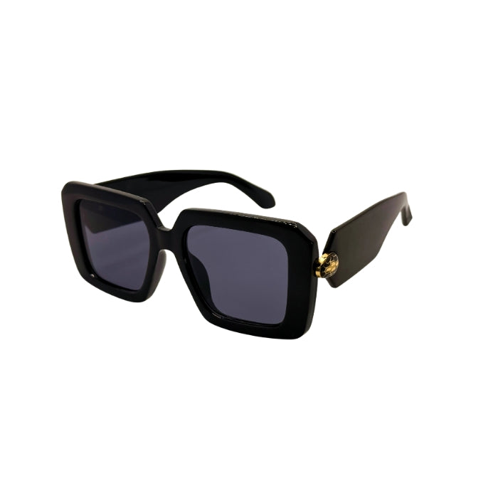 Black sunglasses with a gold accent on a white background