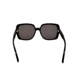 Black sunglasses with dark lenses on a white background