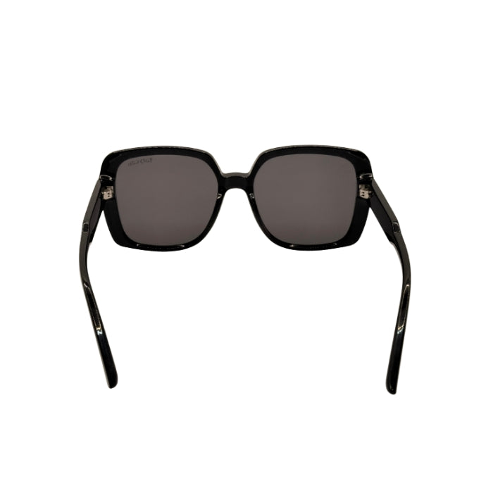 Black sunglasses with dark lenses on a white background