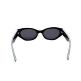 Black sunglasses with white frames on a white background