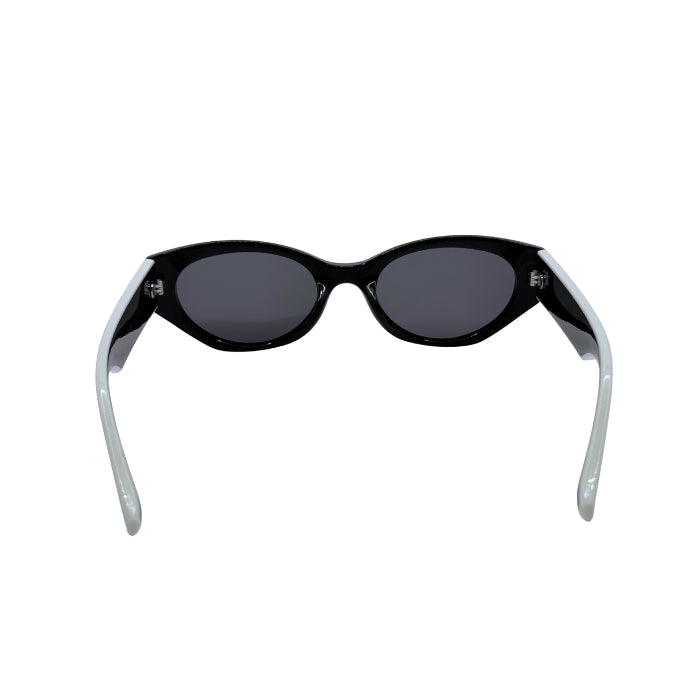 Black sunglasses with white frames on a white background