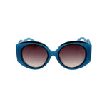 Blue sunglasses with gradient lenses on a white background
