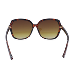 Sunglasses with tortoiseshell frame and brown gradient lenses on a white background
