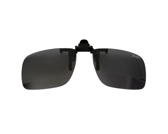A pair of black clip-on sunglasses with a sleek design, attached to a pair of prescription glasses.