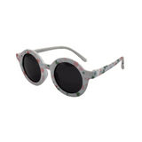 Children's round sunglasses with floral pattern on the frame, featuring polarized lenses.