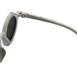Hinges of Children's round sunglasses with floral pattern on the frame, featuring polarized lenses.