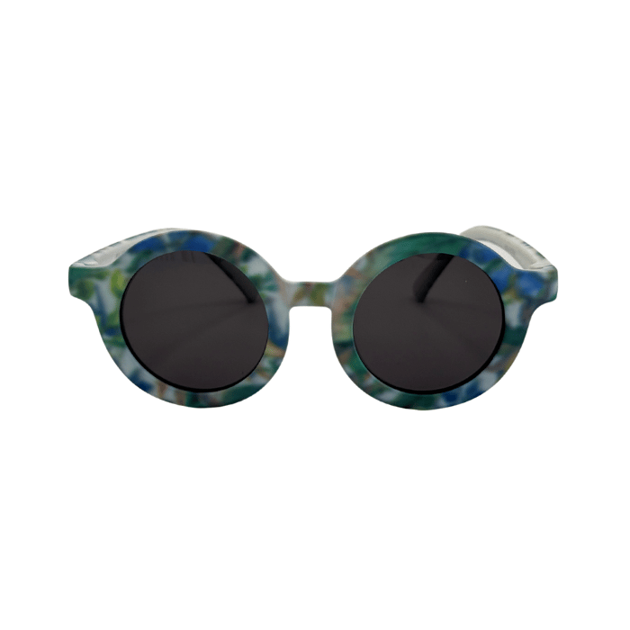 Children's round sunglasses with floral pattern on the frame, featuring uv protected lenses.