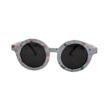 Front View of Children's round sunglasses with floral pattern on the frame, featuring polarized lenses.