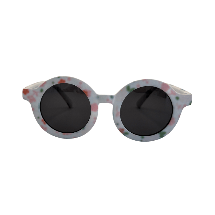 Front View of Children's round sunglasses with floral pattern on the frame, featuring polarized lenses.