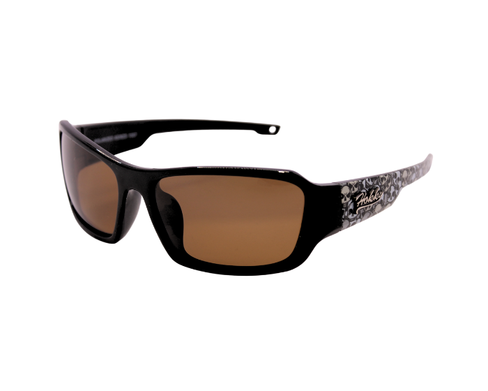 A pair of 'Outlaw' sunglasses featuring a black frame with patterned temples and brown polarized lenses.