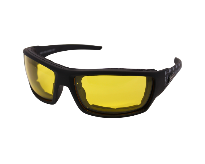 A pair of black motorcycle goggles with yellow lenses and decorative silver accents on the arms.
