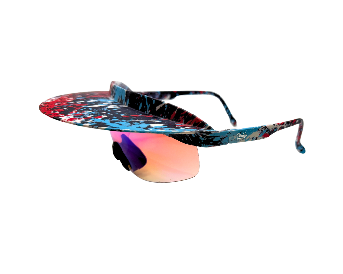 A pair of 'Tidal' 2 in 1 visor sunglasses with a multicolored Speckle frame and  polarized lenses.