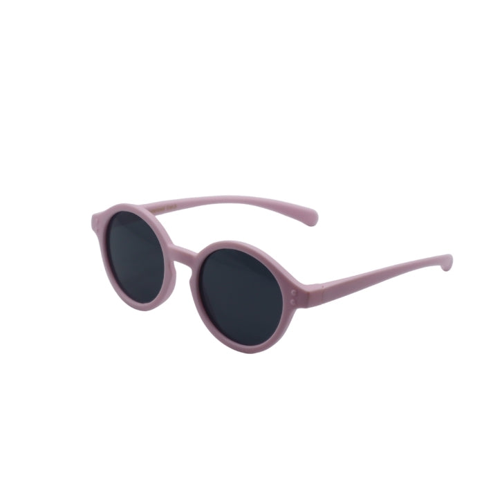 Pink sunglasses with dark lenses on a white background