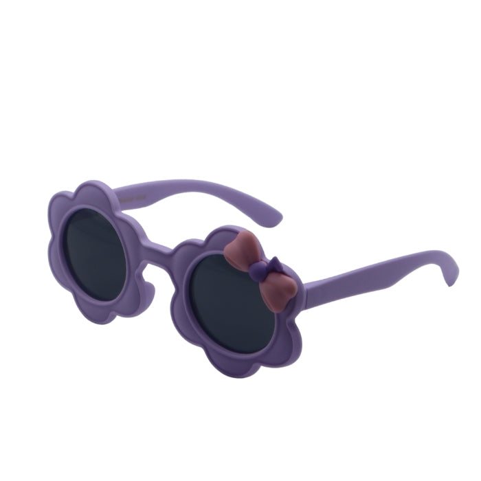 Purple sunglasses with a bow on a white background