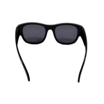 Black sunglasses with dark lenses on a white background