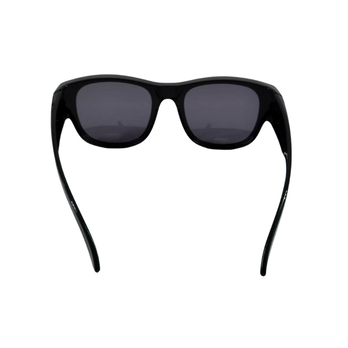 Black sunglasses with dark lenses on a white background
