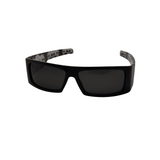 Black sunglasses with dark lenses on a white background