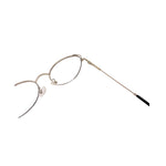 Pair of eyeglasses with a long handle on a white background