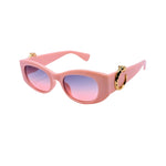 Pink sunglasses with a gold chain on a white background