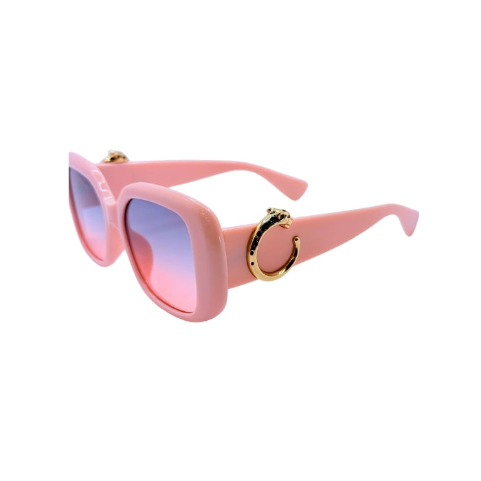 Pink sunglasses with gold accents on a white background
