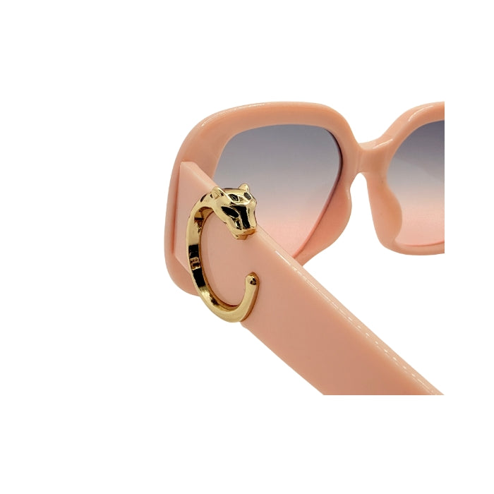 Pink sunglasses with gold accents on a white background