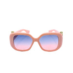 Pink sunglasses with gradient lenses on a white background