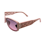 Pink sunglasses with intricate frame design on a white background