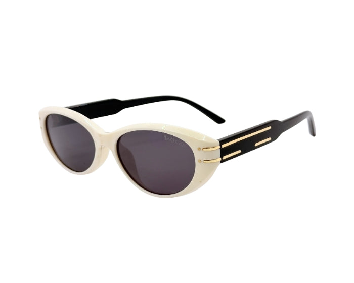 Sunglasses with a cream frame and black lenses on a white background