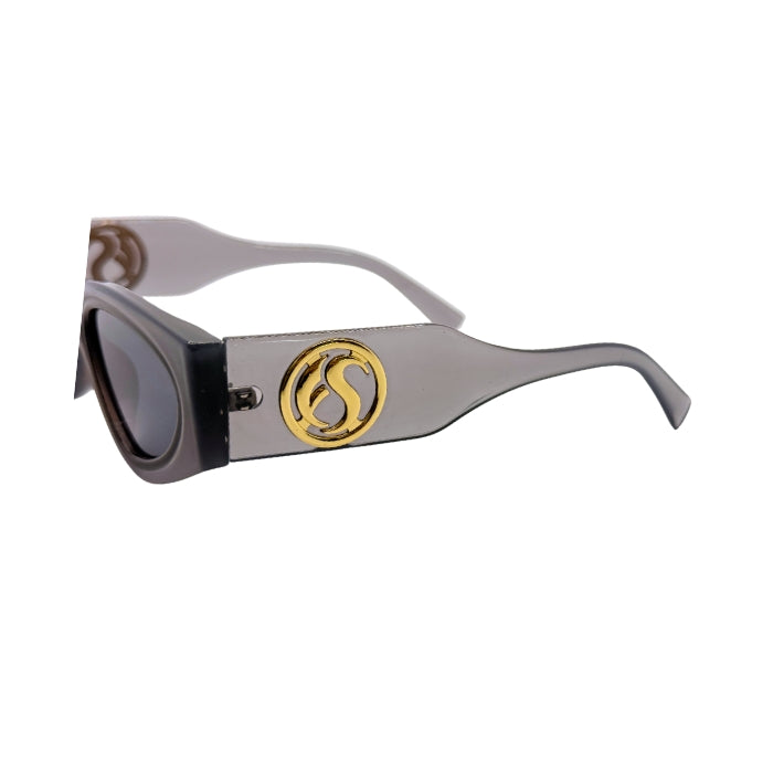 Sunglasses with a gold logo on a white background
