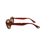 Sunglasses with brown frame and lenses on a white background
