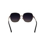 Sunglasses with dark lenses and gold frames on a white background