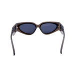 Sunglasses with dark lenses and brown frame on a white background