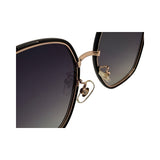 Sunglasses with gold frame and black gradient lenses on a white background