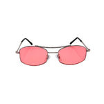 Sunglasses with pink lenses and thin metal frame on a white background