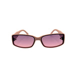 Sunglasses with pink lenses and brown frame on a white background
