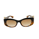 Sunglasses with tortoiseshell frame and brown lenses on a white background