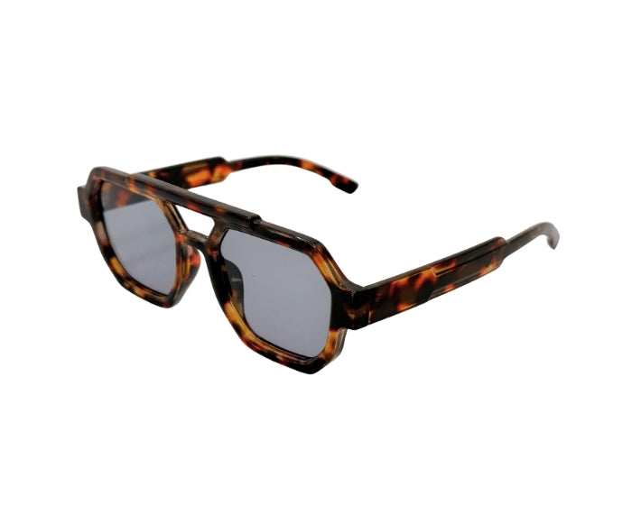 Sunglasses with tortoiseshell frame and dark lenses on a white background